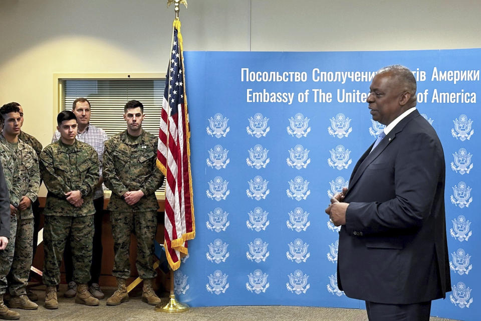 U.S. Secretary of Defense Lloyd Austin, right, speaks to employees of the U.S. embassy in Kyiv, Monday, Nov. 20, 2023, during his visit to Ukraine. Austin has made an unannounced visit to Kyiv Monday, in what is expected to be a high-profile push to keep money and weapons flowing to Ukraine even as U.S. and international resources are stretched by the new global risks raised by the Israel-Hamas conflict. (W.G. Dunlop/Pool via AP)