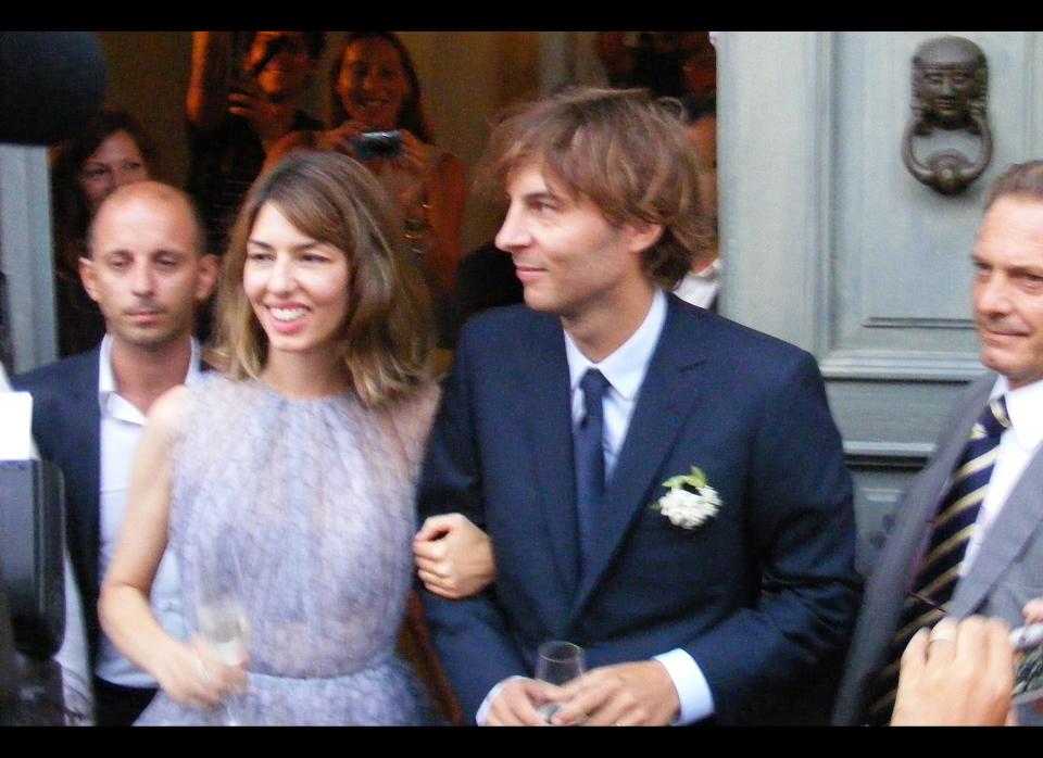 Leave it to Sofia Coppola to bend the rules when it comes to a traditional wedding. The film director opted for a lavender knee-length dress instead of the standard white gown, as she wed husband Thomas Mars last Saturday. In true Coppola style, the dress was custom-made Azzedine Alaia. The intimate wedding of 80 guests took place at the Coppolas' private villa estate in Bernalda, Italy, <a href="http://www.people.com/people/article/0,,20522387,00.html?xid=rss-topheadlines" target="_hplink">according to <em>People</em> magazine</a>. We think our invite must have gotten lost in the mail... (Getty photo)