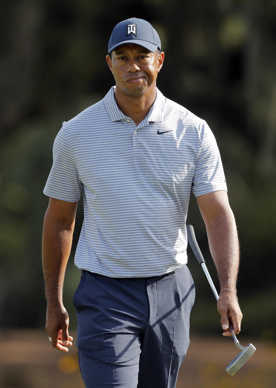 Tiger Woods reacts to a missed putt on the 12th hole during the second round of The Players Championship golf tournament Friday, March 15, 2019, in Ponte Vedra Beach, Fla. (AP Photo/Gerald Herbert)