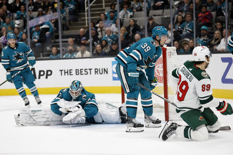 San Jose Sharks goaltender James Reimer reacts to a goal by Minnesota Wild center Frederick Gaudreau (89) during the second period of an NHL hockey game in San Jose, Calif., Saturday, March 11, 2023. (AP Photo/Josie Lepe)