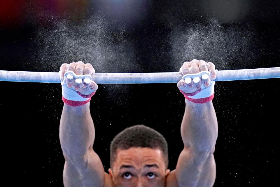 Joe Fraser (GBR) competes on the high bar in the mens gymnastics team final during the Tokyo 2020 Olympic Summer Games at Ariake Gymnastics Centre on July 26, 2021. 