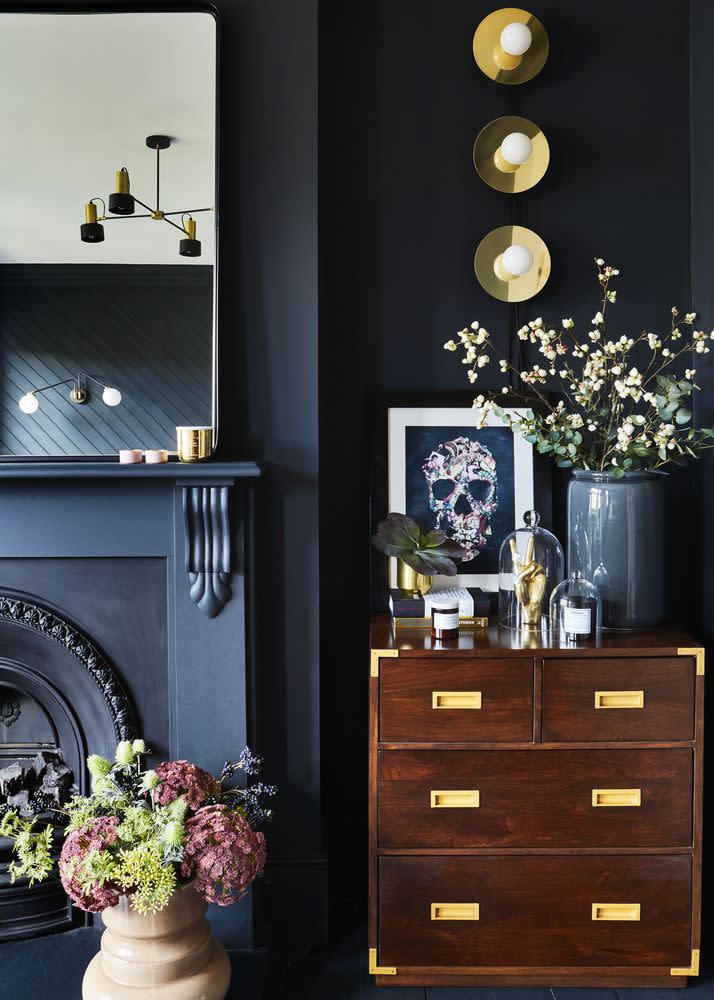 <p>'There is a misconception that painting a small room with dark colours will shrink the room – this is not true,' says paint expert, Michael Rolland at <a href="https://www.thepaintshed.com" rel="nofollow noopener" target="_blank" data-ylk="slk:The Paint Shed;elm:context_link;itc:0;sec:content-canvas" class="link ">The Paint Shed</a>. 'Dark colours don’t always lead to small, dark spaces. Dark colours can be a good idea for poorly lit rooms and smaller rooms because you are playing to the limitations of natural light rather than fighting it.</p><p>'Combined with the right textures and finishes, opting for dark paint in a small room can often create a cosy, calm space with a moody undertone.'</p><p><strong>Read more: <a href="https://www.housebeautiful.com/uk/decorate/walls/a43401876/paint-colour-mistakes/" rel="nofollow noopener" target="_blank" data-ylk="slk:6 paint colour mistakes to avoid when decorating your home;elm:context_link;itc:0;sec:content-canvas" class="link ">6 paint colour mistakes to avoid when decorating your home</a></strong></p>