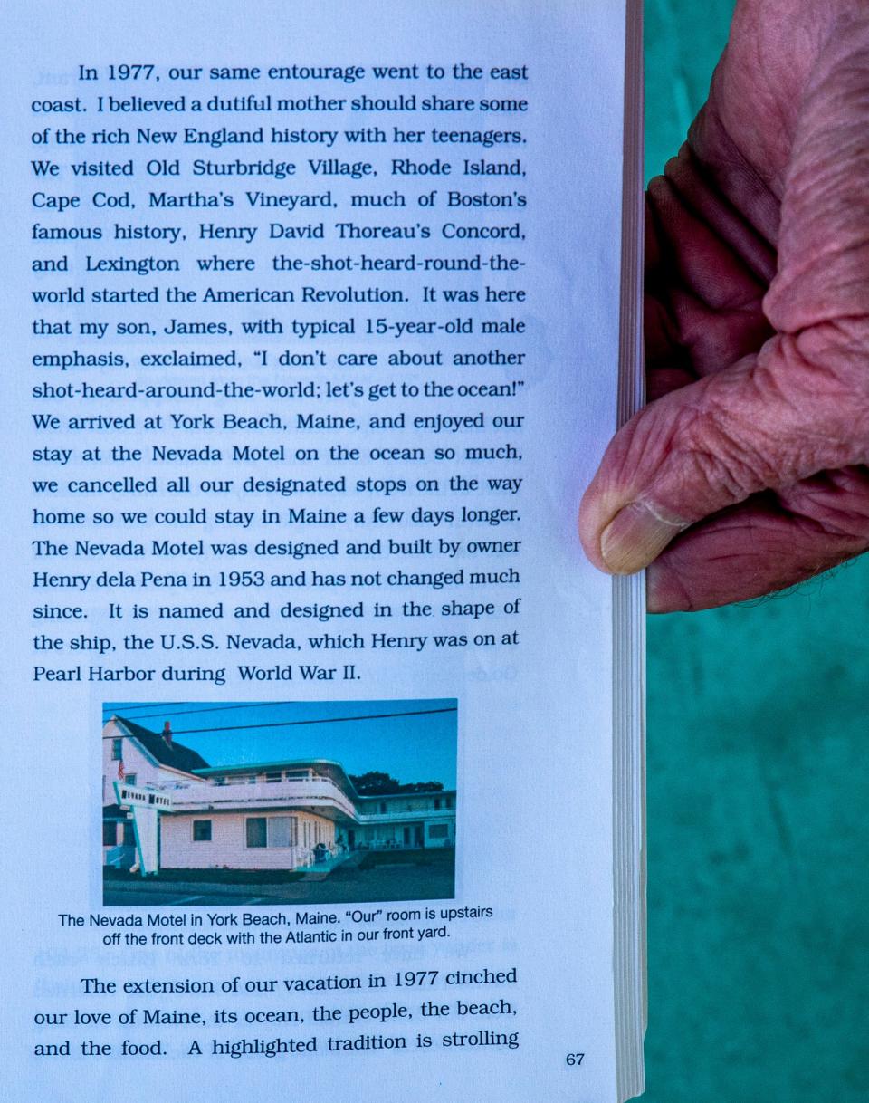 Paul de la Pena, 65, holds a book referencing the Nevada Motel. The book was authored by Barbara Snell Davis, a guest from Mentor, Ohio, who de la Pena referred to as "Miss Ohio," over the many decades that Davis returned to Pena's family-owned motel.