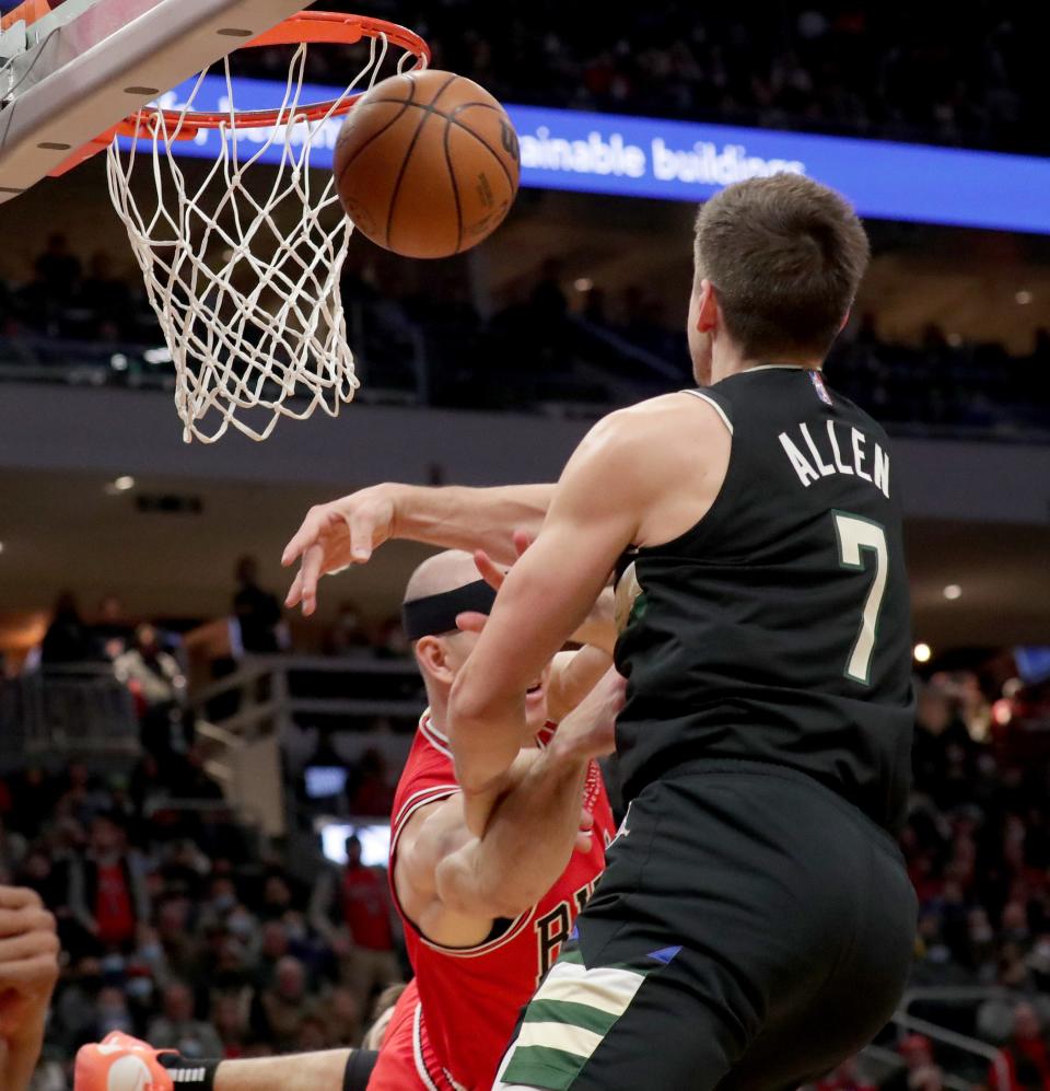 Bucks guard Grayson Allen fouls Bulls guard Alex Caruso, which officials later ruled a Flagrant 2 foul and led to the ejection of Allen during the third quarter at Fiserv Forum on Friday night.