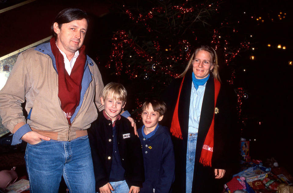 Macaulay Culkin with parents and brother