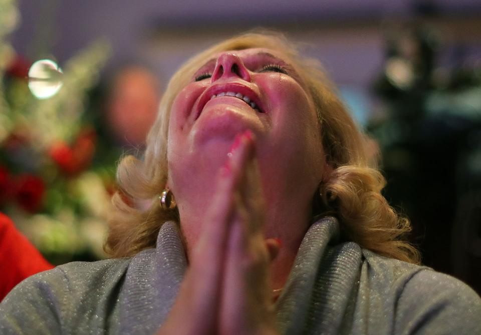 Donald Trump supporter Tina Macneil from Canton cries as Florida was won by Trump as she watched the election results at an election night watch party for Donald Trump supporters at the F1 indoor care racetrack ballroom in Braintree, Mass., on Nov. 8, 2016. (Photo: John Tlumacki/The Boston Globe via Getty Images)
