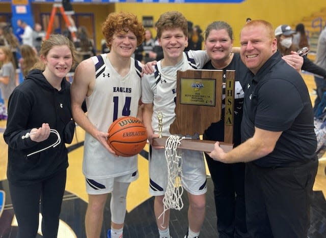 The Hibbard family takes a photo after Elkhart Christian Academy won a Class 1A regional championship Saturday, March 9, 2024. Pictured, from left, are Mia, Aiden, Kian, Laura and Chad.
