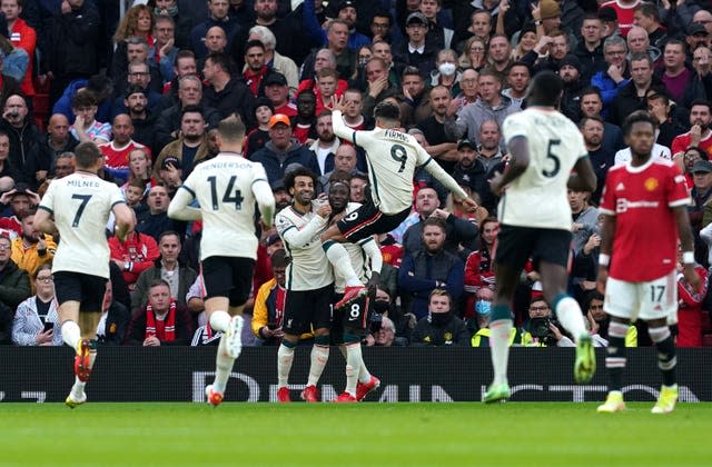 Liverpool players celebrate scoring