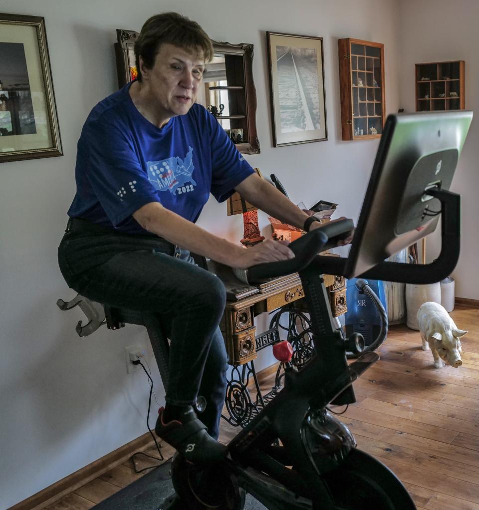 Rebekah Darnell from Okemos virtually riding Sunday, April 16, 2023, in the Braille Across America Virtual Challenge, which she hopes will raise awareness for Braille education.