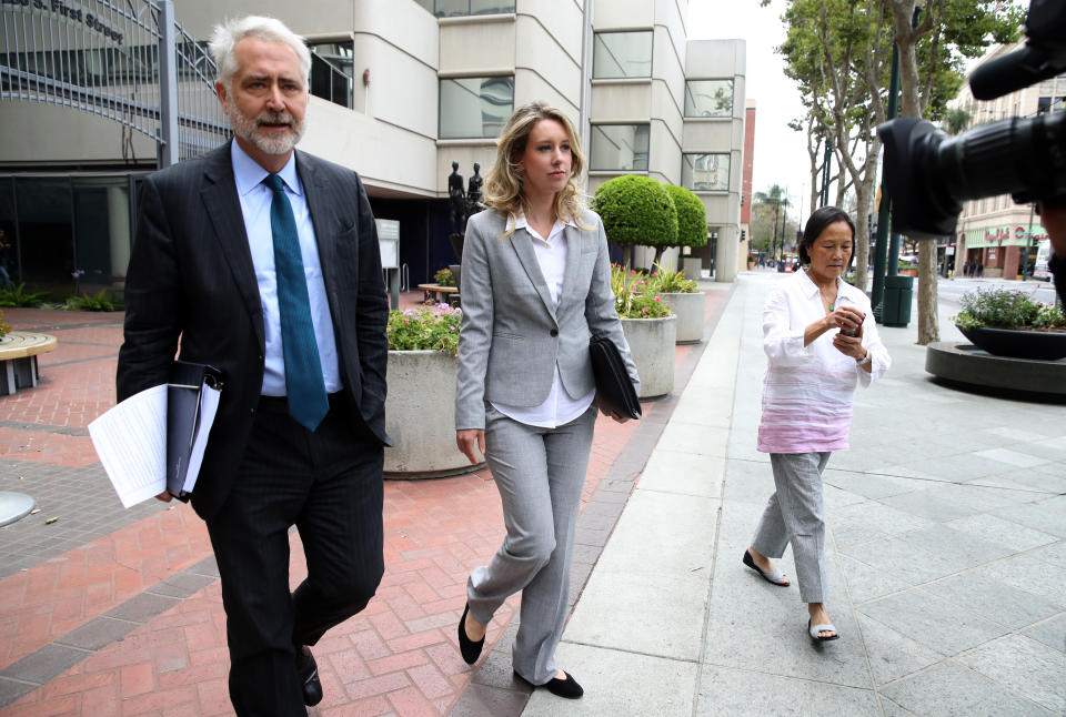 Elizabeth Holmes leaves U.S. Federal Court on June 28, 2019, in a gray suit. (Photo: Justin Sullivan via Getty Images)