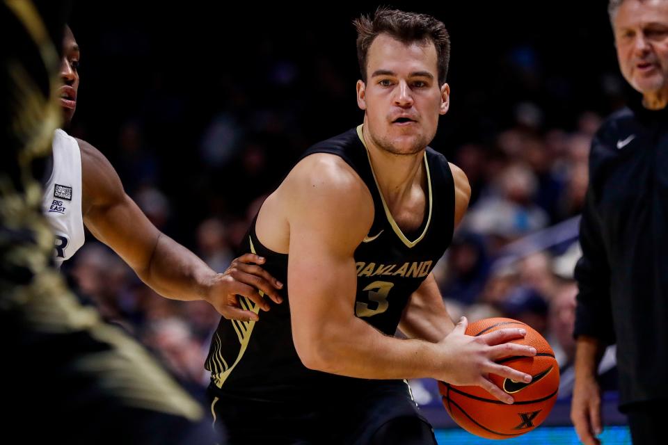 Oakland's Jack Gohlke, who was a Pewaukee High School graduate, is shown in a game against Xavier on Nov. 27. Gohlke had eight three pointers and scored a career-high 27 points against UWM in double overtime Saturday night in Milwaukee.