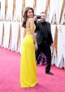 <p>Another strappy back for ya! Eiza Gonzalez's bright yellow gown gave off major happy vibes at the 2018 Oscars. </p>