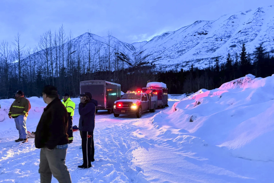 Emergency personnel respond to reports of an avalanche alongside the Seward Highway on Kenai Peninsula Tuesday, Feb. 13, 2024.