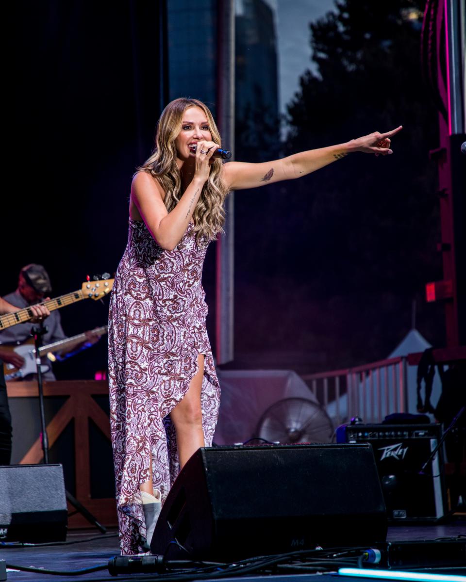 Carly Pearce, shown performing in August in Nashville, has a bond with her fans that she amplifies with meet and greet opportunities.