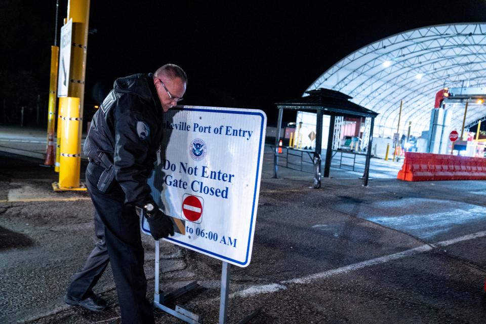 Security personnel removes a closure barrier at the Lukeville Port of Entry on Jan. 4, 2024. The port of entry reopened on Jan. 4 after it closed on Dec. 4, 2023, reassigning port officers to assist the processing of asylum seekers.