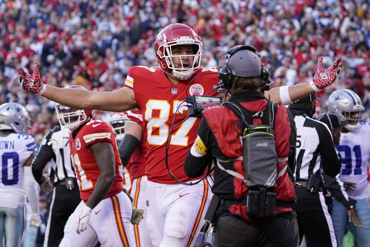 Kansas City Chiefs tight end Travis Kelce (87) celebrates after scoring during the first half of an NFL football game against the Dallas Cowboys Sunday, Nov. 21, 2021, in Kansas City, Mo. (AP Photo/Ed Zurga)