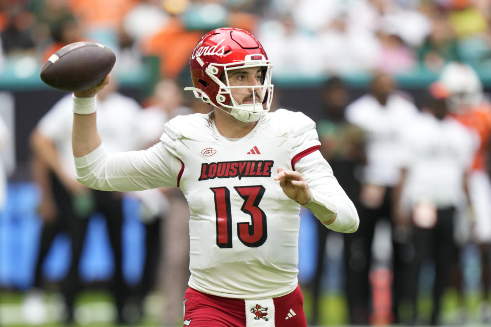 Louisville quarterback Jack Plummer prepares to pass during the first half of an NCAA college football game against Miami, Saturday, Nov. 18, 2023, in Miami Gardens, Fla. (AP Photo/Wilfredo Lee)