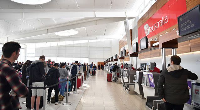 A queue can be seen at the Virgin Australia check in area during their nationwide computer outage. Picture: AAP/Morgan Sette