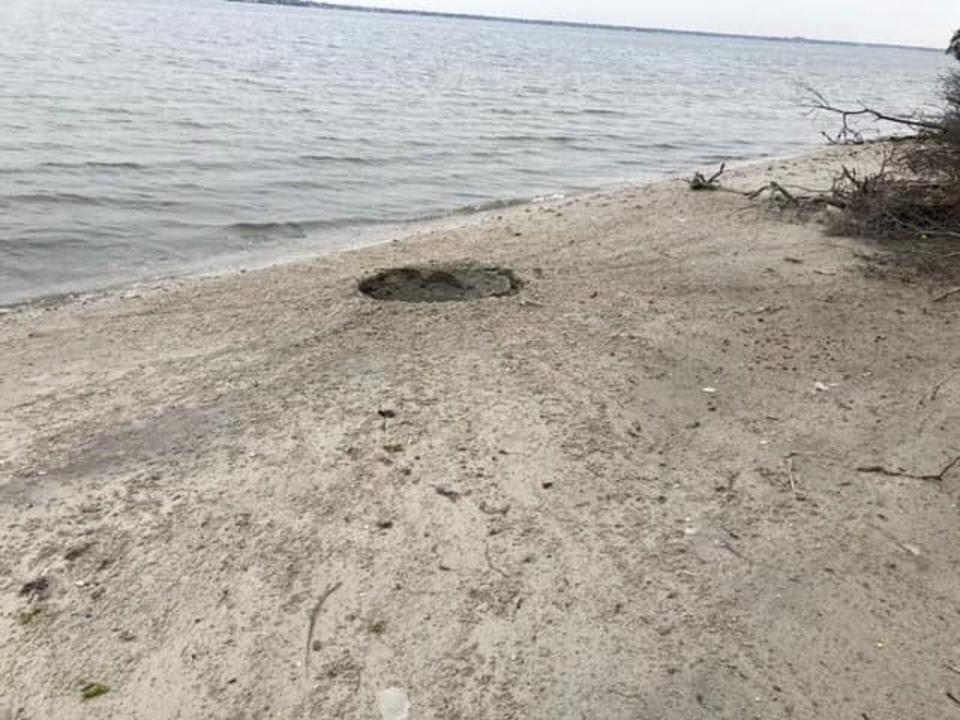 An unspecified device left a 4ft-wide and 2ft-deep crater on Fox Island in New York (Suffolk County Police Department )