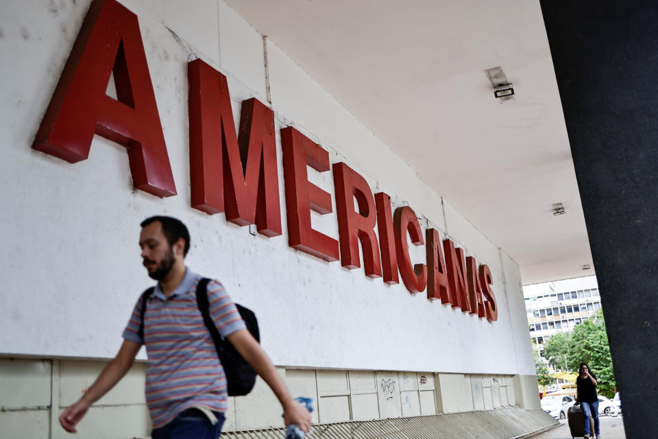 People walk in front of a Lojas Americanas store in Brasilia, Brazil January 12, 2023. REUTERS/Ueslei Marcelino