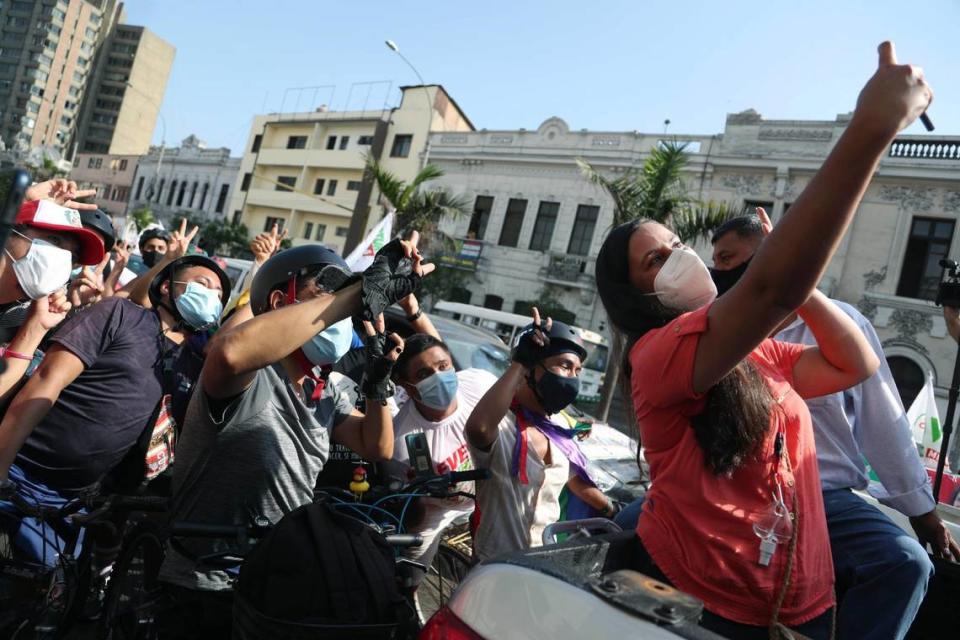 Together for Peru party presidential candidate Veronika Mendoza takes a selfie with her supporters during a campaign rally in Lima, Peru, Tuesday, April 6, 2021. Peru’s general election is set for April 11.