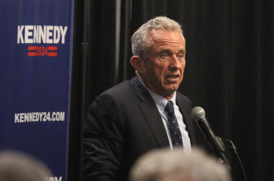 Robert F. Kennedy Jr. speaks to a crowd at the Doubletree Hilton in downtown Lansing on Oct. 7, 2023.