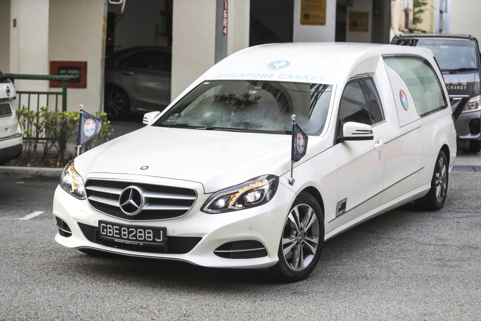 A hearse carrying the body of former Zimbabwe President Robert Mugabe leaves the Singapore Casket Funeral Parlour for the airport in Singapore Wednesday, Sept. 11, 2019. Mugabe died Friday, Sept. 6 at a hospital in Singapore at age 95. (AP Photo/Danial Hakim)