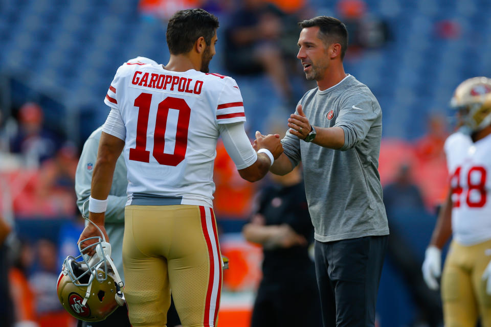 Niners head coach Kyle Shanahan (right) has put Jimmy Garoppolo in a position to succeed with high volumes of play-action. (Photo by Justin Edmonds/Getty Images)