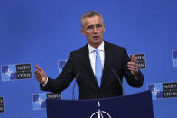 NATO's Secretary General Jens Stoltenberg talks to journalists during a press conference at the second day of a NATO defense ministers meeting at NATO headquarters in Brussels, Thursday, Feb. 14, 2019. NATO defense ministers are discussing the future of the alliance's operation in Afghanistan and how best to use its military presence to support political talks aimed at ending the conflict. (AP Photo/Francisco Seco)