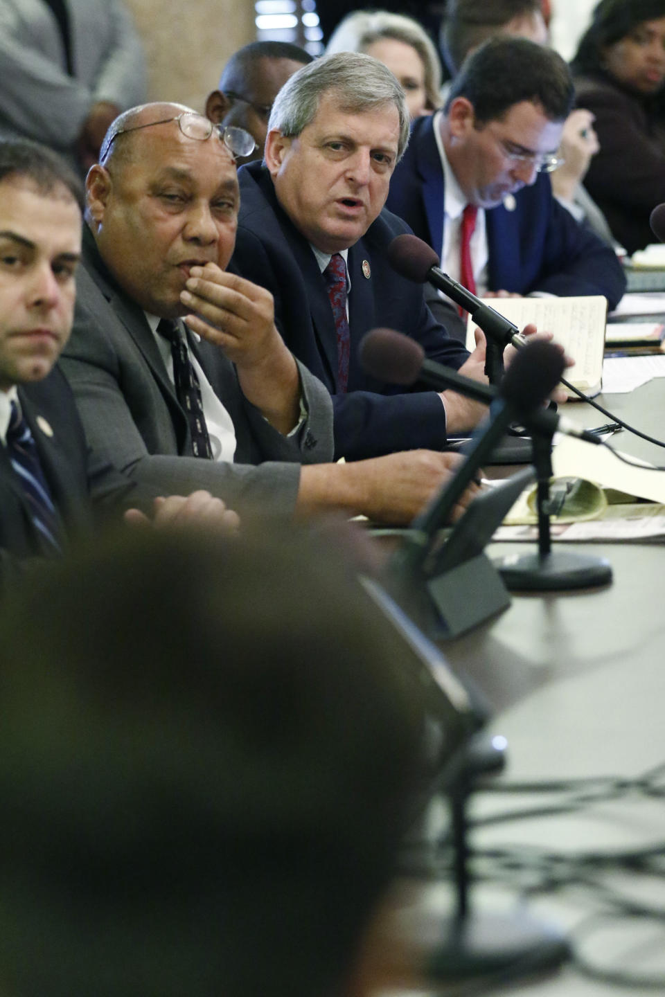 Rep. Donnie Scoggin, R-Ellisville, top center, asks a question of Cliff Johnson, director of the MacArthur Justice Center, during a joint hearing of the House Corrections and Judiciary B Committees, Thursday, Feb. 13, 2020 at the Capitol in Jackson, Miss. Johnson presented a number of prison reform suggestions to the lawmakers. (AP Photo/Rogelio V. Solis)