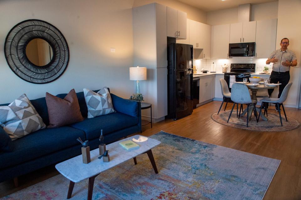 Doug Snyder shows an apartment at Cadence on Thursday during a tour of the new senior housing project in Fort Collins.