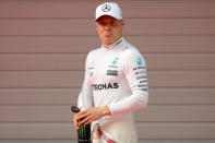 Formula One - F1 - Chinese Grand Prix - Shanghai, China - 08/04/17 - Mercedes driver Valtteri Bottas of Finland reacts after the qualifying session at the Shanghai International Circuit. REUTERS/Aly Song