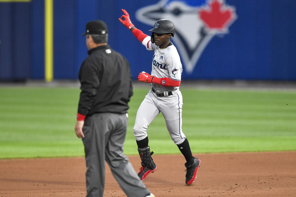 Miami Marlins shortstop Jazz Chisholm Jr. (2) gestures as he runs the bases after hitting a two-run home run against the Toronto Blue Jays during the third inning of a baseball game in Buffalo, N.Y., Wednesday, June 2, 2021. (AP Photo/Adrian Kraus)