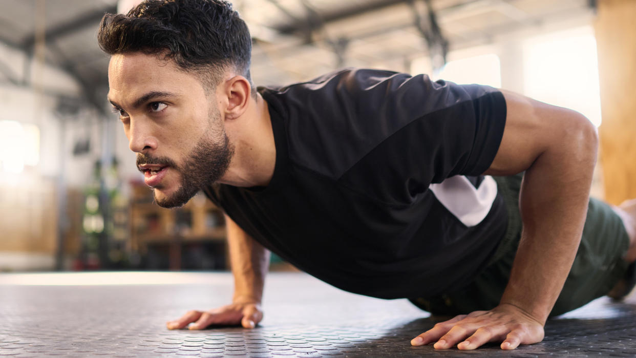  Man doing push ups. 