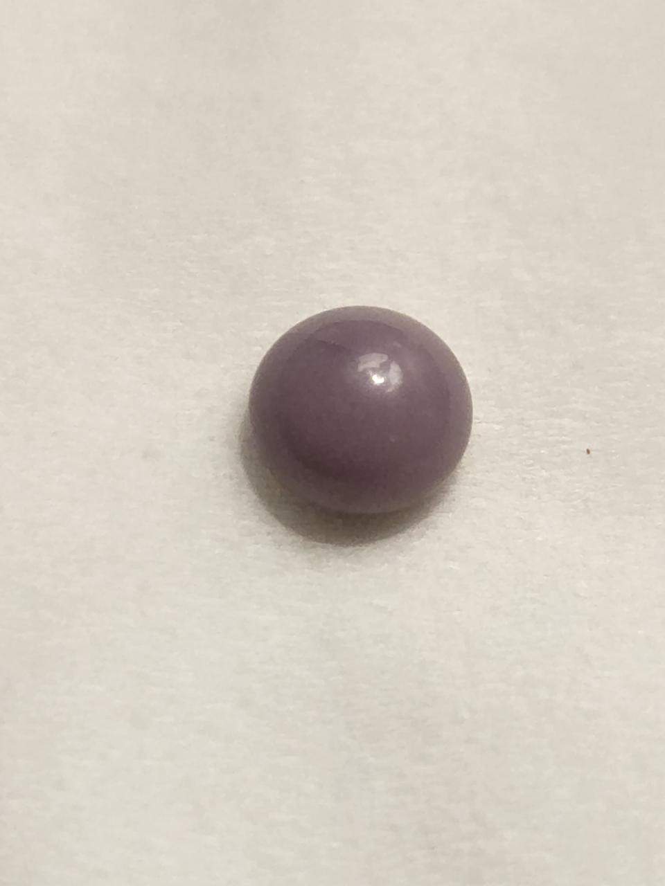 At first, Overland says his wife thought the pearl was a type of purple candy. (Photo: Scott Overland)
