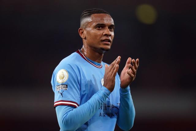 Manchester City's Manuel Akanji heads the ball during the