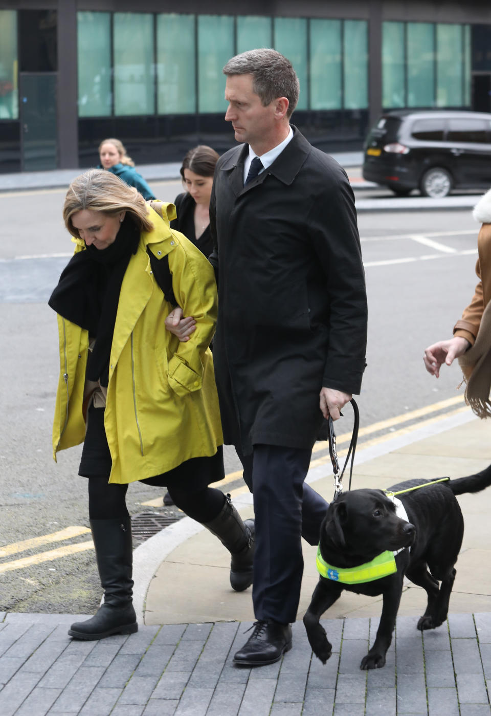 Lord Holmes of Richmond leaves Southwark Crown Court, in London, where he is due to stand trial for sexual assault.