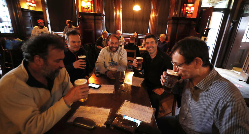 People enjoy drinking at The Forester pub in Ealing, London. Source: AAP