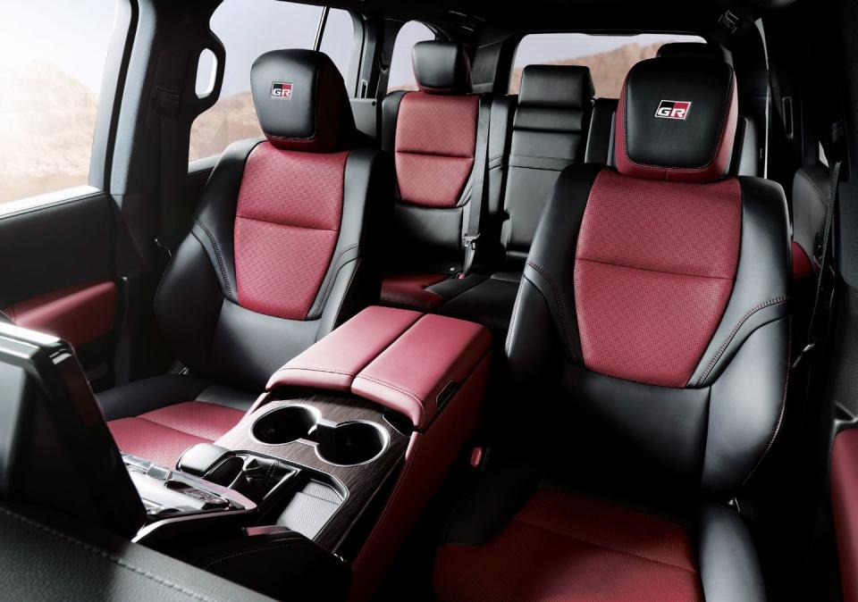 <p>Land Cruiser GR Sport models feature a black and red interior along with faux carbon trim and GR Sport logos in the headrests and on the steering wheel. </p>