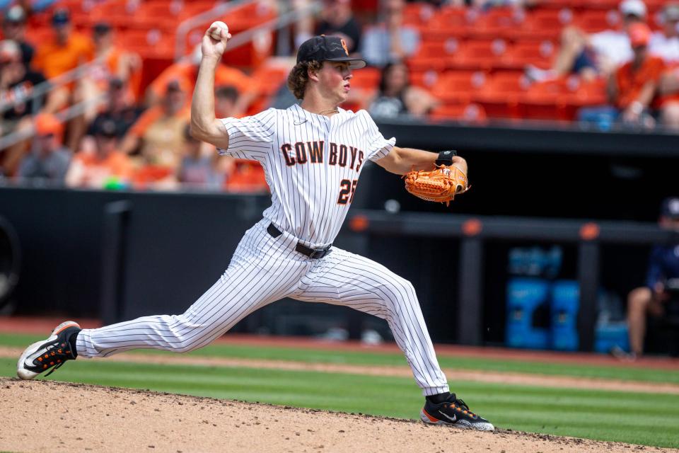 Oklahoma State pitcher Gabe Davis (22) pitches during a game in the NCAA Stillwater Regional between the Oklahoma State Cowboys (OSU) and the Dallas Baptist Patriots at O'Brate Stadium in Stillwater, Okla., on Saturday, June 3, 2023.