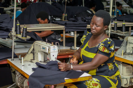 A worker prepares a garment at the the Utexrwa garment factory in Kigali, Rwanda April 17, 2018. Picture taken April 17, 2018. REUTERS/Jean Bizimana