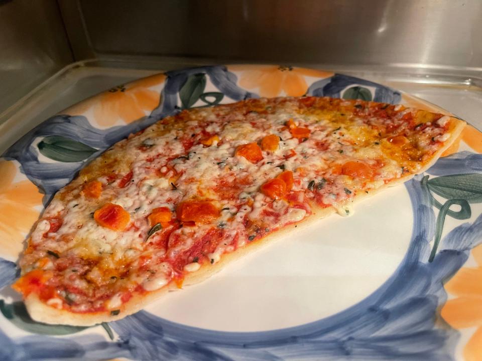 Pizza almost fully cooked in microwave