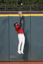 Cleveland Indians' Delino DeShields makes a leaping catch to get out Chicago White Sox's Tim Anderson during the ninth inning of a baseball game, Monday, Sept. 21, 2020, in Cleveland. (AP Photo/Ron Schwane)