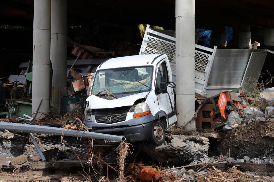 A damaged truck following heavy rains and floods lies in ruins after heavy rain.