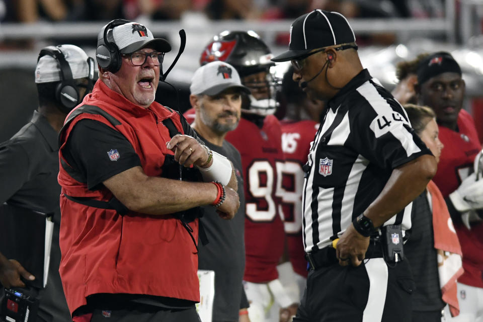 Tampa Bay Buccaneers head coach Bruce Arians yells at down judge Frank LeBlanc (44) during the second half of an NFL preseason football game Saturday, Aug. 21, 2021, in Tampa, Fla. (AP Photo/Jason Behnken)