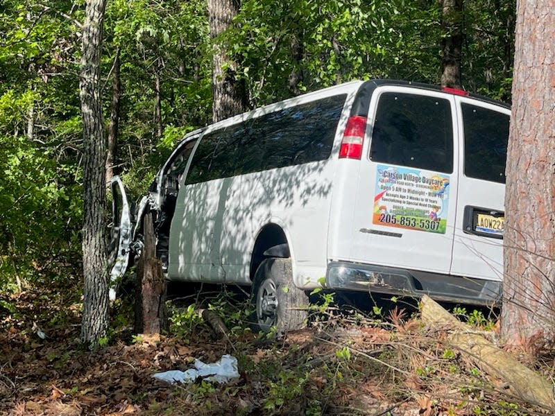 A van carrying children and one adult is pictured after crashing into tree just outside of Pinson, Alabama on its way to Kermit Johnson Elementary School.