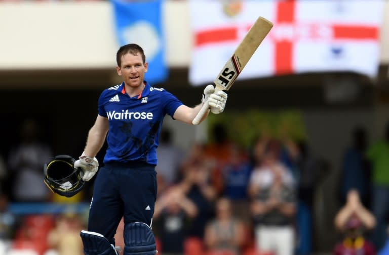 England's cricket team captain Eoin Morgan celebrates after scoring his century during their One Day International against the West Indies in St. John's, Antigua, on March 3, 2017