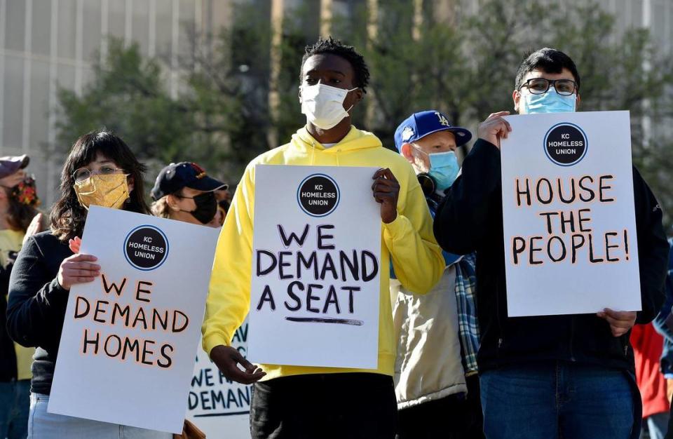 KC Homeless Union holds a rally Thursday, April 1, 2021, to protest what they say is a notice to vacate the grounds of City Hall. KC Tenants join them. More than 100 people attended, many held signs.