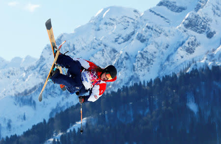 FILE PHOTO: Britain's James Woods performs a jump during the men's freestyle skiing slopestyle qualification round at the 2014 Sochi Winter Olympic Games in Rosa Khutor, Russia, February 13, 2014. REUTERS/Lucas Jackson/File Photo