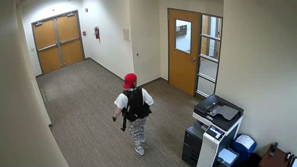 PHOTO: A still image from surveillance video shows what the Metropolitan Nashville Police Department describe as mass shooting suspect Audrey Elizabeth Hale, 28, inside The Covenant School carrying weapons in Nashville, Tenn., March 27, 2023. (Metropolitan Nashville Police Dept.)